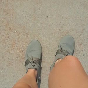 Pair of army stylish tennis shoes